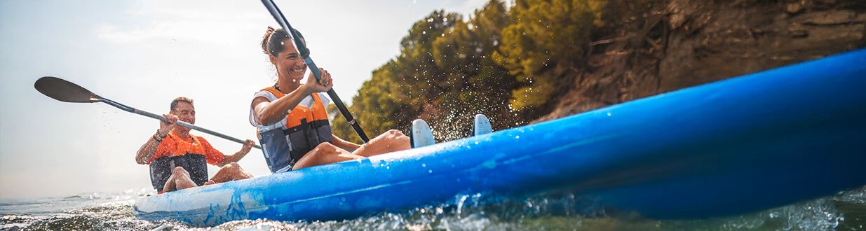 a man and his father in a kayak do-kayaks-tip-over-easily
